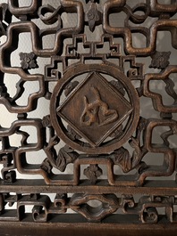 Four Chinese carved and openworked wooden doors, early 20th C.