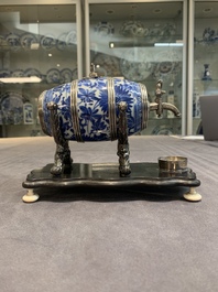A Dutch silver-mounted Chinese blue and white barrel, silver dated 1857, Kangxi
