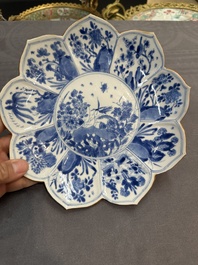 A pair of Chinese lotus-shaped blue and white plates with floral design, yu mark, Kangxi