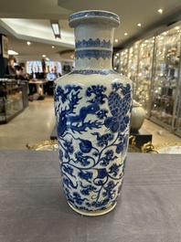 A Chinese blue and white 'phoenix and peony scroll' rouleau vase, Kangxi