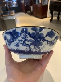 A Chinese blue and white 'Bleu de Hue' 'roosters and chick' plaque in a carved wooden screen and a bowl, 19th C.