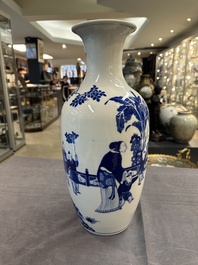 A Chinese blue and white vase with ladies and playing boys in a garden, 19th C.