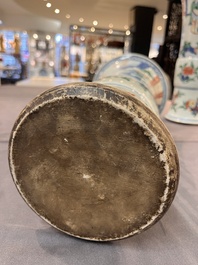 A pair of Chinese wucai 'gu' vases with narrative design, Transitional period