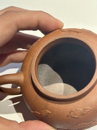 Three Chinese Yixing stoneware teapots and covers, 18th C.