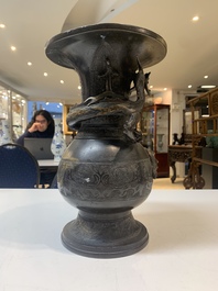A Chinese archaistic bronze gold-splashed 'dragon' vase, Dong 東 mark, Ming