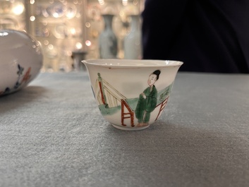 A Chinese famille verte ovoid tea caddy with floral design and a cup with figural design, Kangxi
