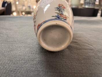 A Chinese famille verte ovoid tea caddy with floral design and a cup with figural design, Kangxi