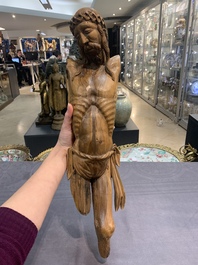 Two carved wooden Corpi Christi and a figure of a monk, Spain and Goa, 16th C.