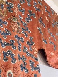 A fine Chinese gold thread embroidered red-ground silk noble lady&rsquo;s 'dragon' robe, 18/19th C.