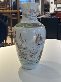 A Chinese famille rose vase with figural design, Qianlong mark, 19th C