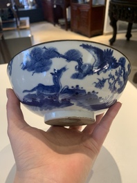 A Chinese blue and white 'Bleu de Hue' 'roosters and chick' plaque in a carved wooden screen and a bowl, 19th C.