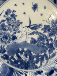 A pair of Chinese lotus-shaped blue and white plates with floral design, yu mark, Kangxi