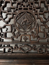Four Chinese carved and openworked wooden doors, early 20th C.