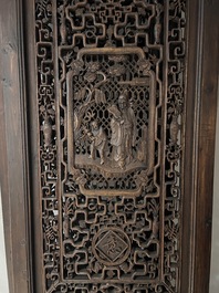 Four Chinese carved and openworked wooden doors, early 20th C.