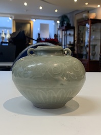 Two Chinese Longquan celadon jars with floral design, Ming