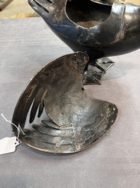 A Chinese bronze duck-form incense burner, Ming