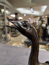 A Chinese bronze duck-form incense burner, Ming