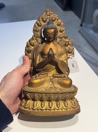 A fine Chinese gilt bronze Buddha, Qianlong mark and of the period