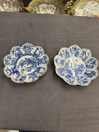 A pair of Chinese lotus-shaped blue and white plates with floral design, yu mark, Kangxi
