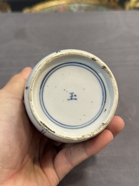 A pair of Chinese blue and white 'Long Eliza' vases and covers, jade mark, Kangxi