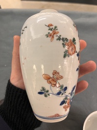 A Chinese famille verte ovoid tea caddy with floral design and a cup with figural design, Kangxi