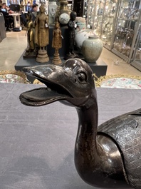 A Chinese bronze duck-form incense burner, Ming