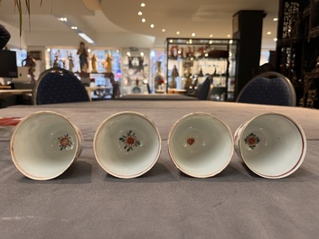 A set of 12 Chinese famille verte cups and saucers with floral design, Kangxi