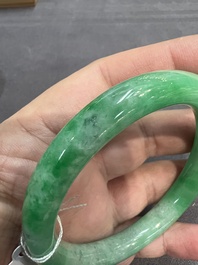 Two Chinese jadeite bracelets, one with 14K gold mounts, 19/20th C.