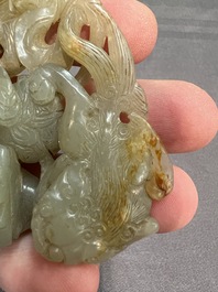 A Chinese jade carving with two Buddhist lions, 19th C.