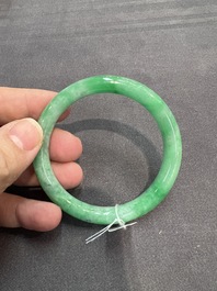 Two Chinese jadeite bracelets, one with 14K gold mounts, 19/20th C.