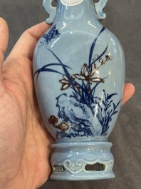 A Chinese copper-red-decorated lavender-blue ground wall pocket vase, 18/19th C.
