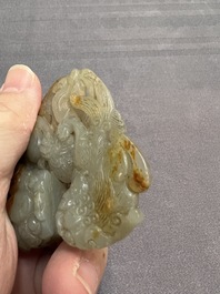 A Chinese jade carving with two Buddhist lions, 19th C.