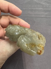 A Chinese jade carving with two Buddhist lions, 19th C.