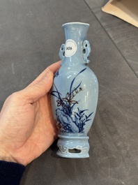A Chinese copper-red-decorated lavender-blue ground wall pocket vase, 18/19th C.