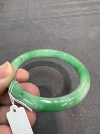 Two Chinese jadeite bracelets, one with 14K gold mounts, 19/20th C.