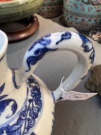 A Chinese blue and white ewer with figures in a landscape, Transitional period