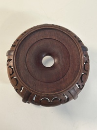 A collection of 11 Chinese wooden stands, 19/20th C.