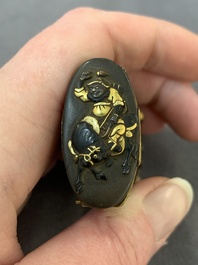 A fine Japanese copper- and gold-inlaid niellated iron pyrogen with hunting scenes, 日本國京都住駒井製 mark, Komai workshop, Kyoto, Meiji period