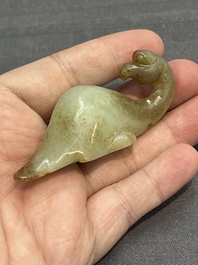 Three Chinese celadon and russet jade carvings of animals, 19th C.