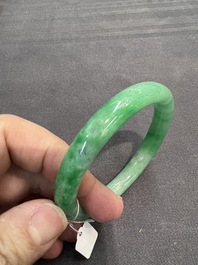Two Chinese jadeite bracelets, one with 14K gold mounts, 19/20th C.