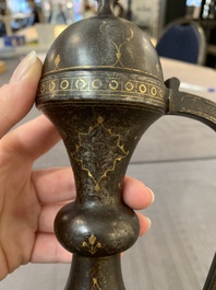 A Persian steel engraved gilt-decorated pear-shaped ewer and cover with floral design, Qajar, 19th C.
