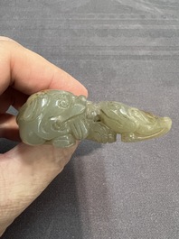 A Chinese jade carving with two Buddhist lions, 19th C.