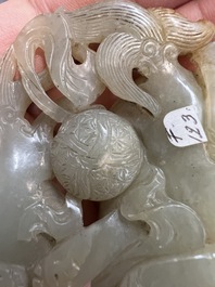 A Chinese jade carving with two Buddhist lions, 19th C.