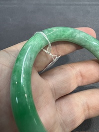 Two Chinese jadeite bracelets, one with 14K gold mounts, 19/20th C.