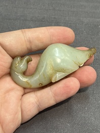 Three Chinese celadon and russet jade carvings of animals, 19th C.