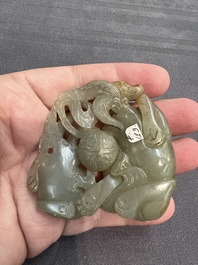 A Chinese jade carving with two Buddhist lions, 19th C.