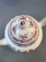 Two Chinese famille rose 'rooster' teapots, a milk jug and four handled cups, Yongzheng