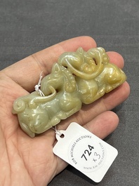 Three Chinese celadon and russet jade carvings of animals, 19th C.