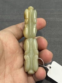 Three Chinese celadon and russet jade carvings of animals, 19th C.