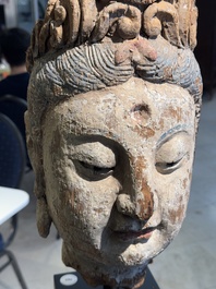A large Chinese polychromed wooden head of Guanyin, probably Ming